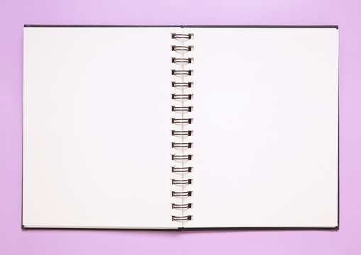 open blank sketchbook on a wood surface Stock Photo