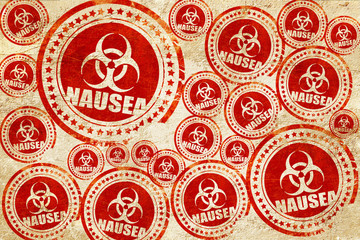 Nausea concept background, red stamp on a grunge paper texture