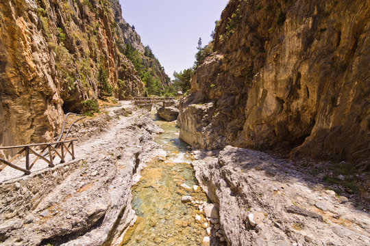 Mountain creek through the rocky soil of Samaria gorge, island of Crete, Greece