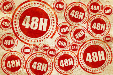48 hours, red stamp on a grunge paper texture