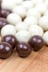 Black and white chocolate candies background