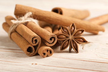 cinnamon and star anise on a wooden background