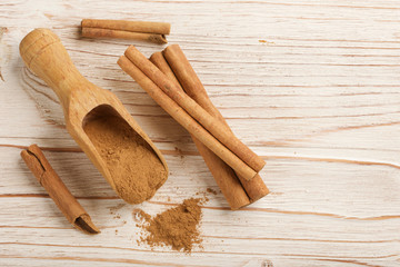 cinnamon on a wooden background