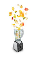 Fruit falling in a juicer on white background