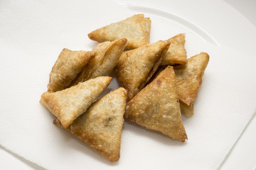 Samosas - fried dough triangle with Meet inside