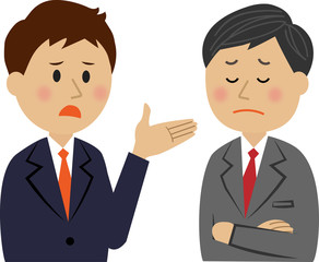 会話するスーツ姿の男性