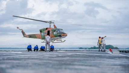 helicopter landing on the navy warship © tantawat