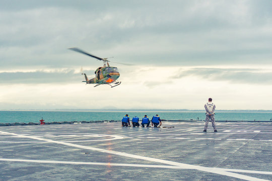 helicopter landing on the navy warship