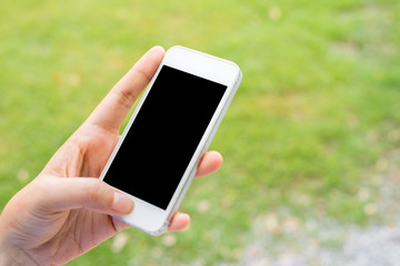 Close up of hands woman using smart phone in the city