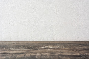 Rustic wooden floor and white wall
