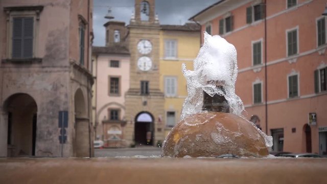 slow motion of a fountain in San Severino Italy Marche