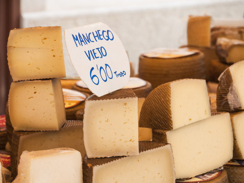 Traditional spanish cheese Manchego for sale at a market at Majorca, Spain, Europe - close-up