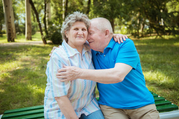 Elderly couple relaxing in the park,