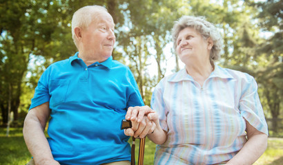 Elderly couple relaxing in the park,