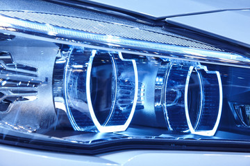 Car light detail in blue tone Vehicle part. Vertical © h368k742