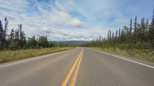 Driving POV low angle hyperlapse. Dalton Highway in  Alaska ,heading to Arctic Circle. 