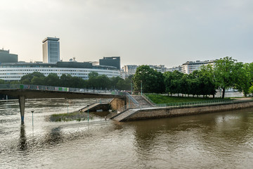 Flood in Paris: Ile aux Cygnes (Swans Island) embankment. France