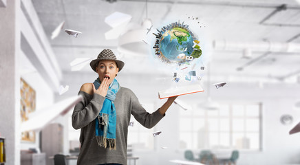 Student girl with book in hands