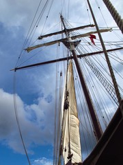 Fototapeta premium ship mast silhouetted by the sky
