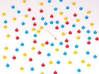 Random group with a match standing out illustrated by coloured plastic board game hats in various colours, Melbourne 2016