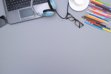 headset on laptop computer keyboard concept for communication, it support, call center and customer service help desk