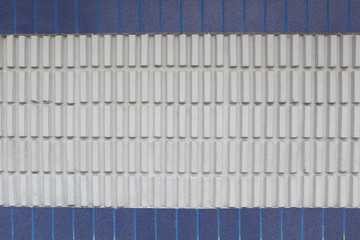 Wall made of cement square shape and have weathered dirty.