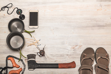 Equipment of hiking gear on floor background