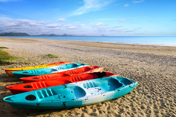 Fototapeta premium Colorful sport kayaks on the tropical beach, Pranburi, Thailand.