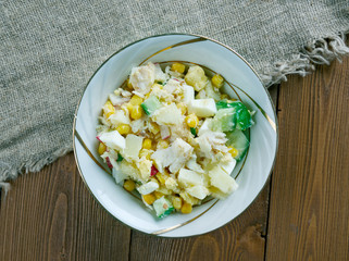 Salad with cod, corn .