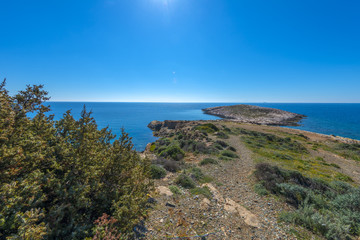 Fototapeta premium Rocky beach in Mykonos, Cyclades, Greece.