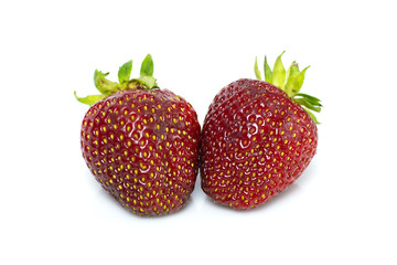 Two strawberries on the white background