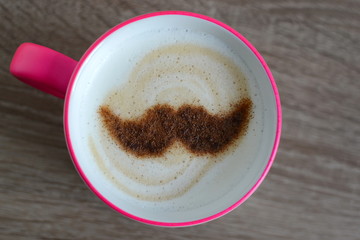 cup of cappuccino with cinnamon