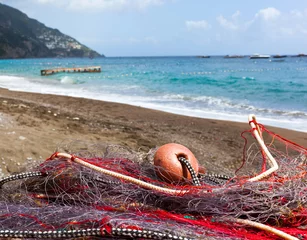 Vlies Fototapete Strand von Positano, Amalfiküste, Italien Fishing nets on the beach of Positano