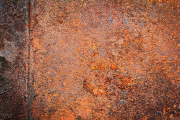 Rusty dirty iron metal plate background. Old rusty metal. Red rusted metal with copy space for text or image. Dark edged.