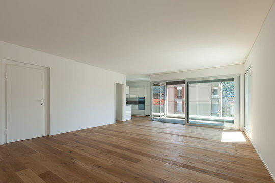 Interior, room with parquet floor and windows