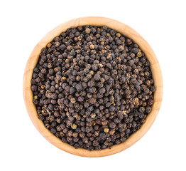 peppercorn in wood bowl isolated on white background