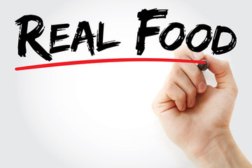 Hand writing Real Food with marker, health concept