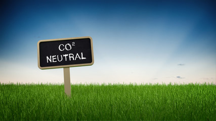 Single sign with carbon neutral text in grass