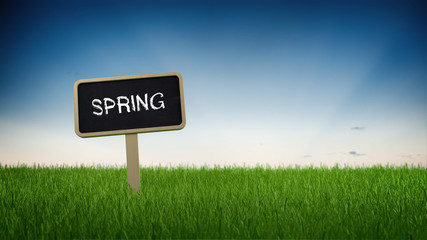 Spring season sign in turf grass