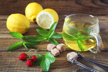 Mint tea with lemons and strawberries