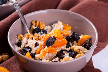 Oatmeal with raisins, dried apricots, plums