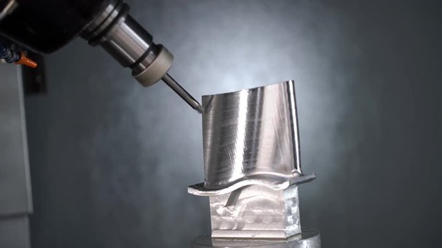 Metalworking CNC milling machine. Cutting metal modern processing technology.