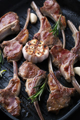 Grilled  lamb meat ribs with spices, garlic and rosemary