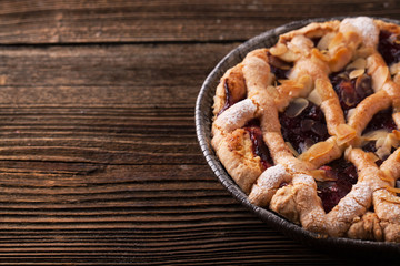 Delicious cake with cherries, icing sugar