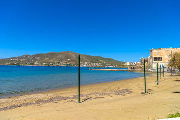 Obraz premium Beautiful sandy beach in Syros, Cyclades, Greece. Crystal clear