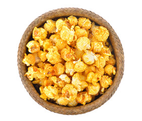 popcorn in basket on white background