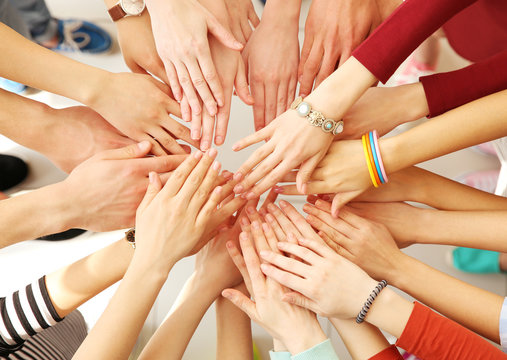 Group of people hands together