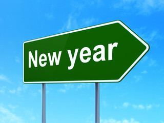 Holiday concept: New Year on road sign background