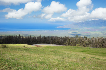 Obraz premium View of Maalaea Bay seen from the lower slopes of Hakeakala. The plain in the middle of the view divides Maui in two.