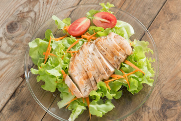 Grilled chicken breast salad. Top view.